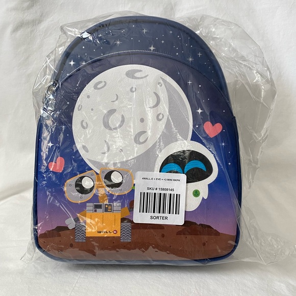 eve mini backpack Loungefly Minnie Mouse New Year's this adorable mini backpack takes the form of EVE adorned in colorful Christmas lights that glow under the cover of darkness Loungefly Disney Pixar WALL-E EVE